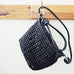SLING HANDBAG OPEN WEAVE BLACK LEATHER