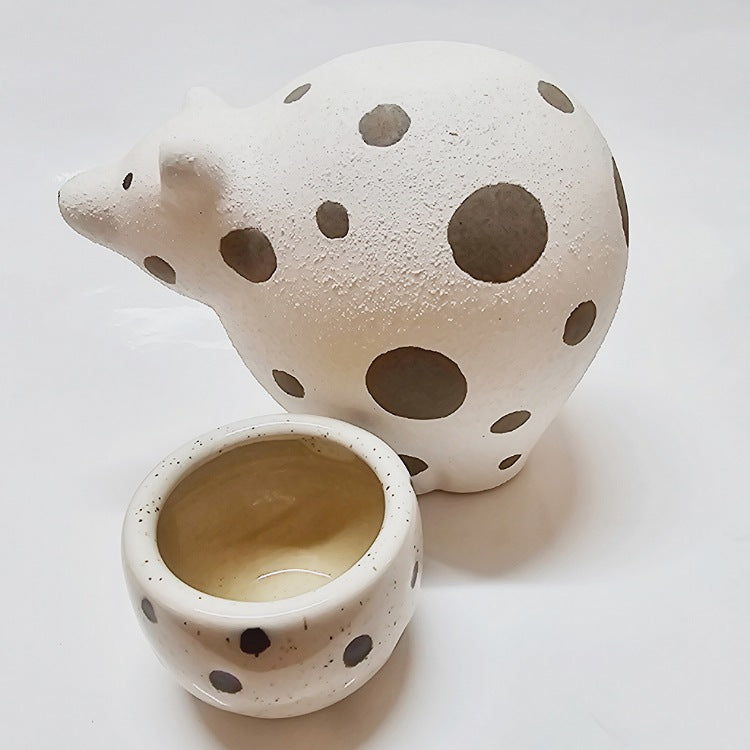 CERAMIC PLANTER ON POLAR BEAR STAND