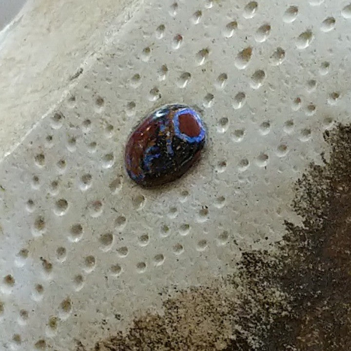 CARVED SANDSTONE WITH OPAL