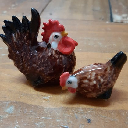 FAT BROWN COCK WITH HEN