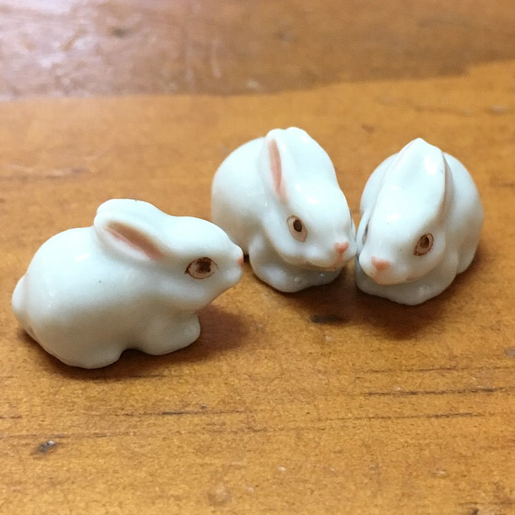 TINY WHITE PORCELAIN RABBITS