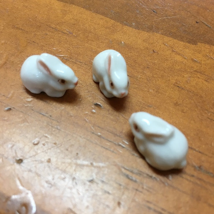 TINY WHITE PORCELAIN RABBITS