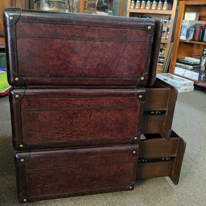 LEATHER THREE DRAWER TABLE