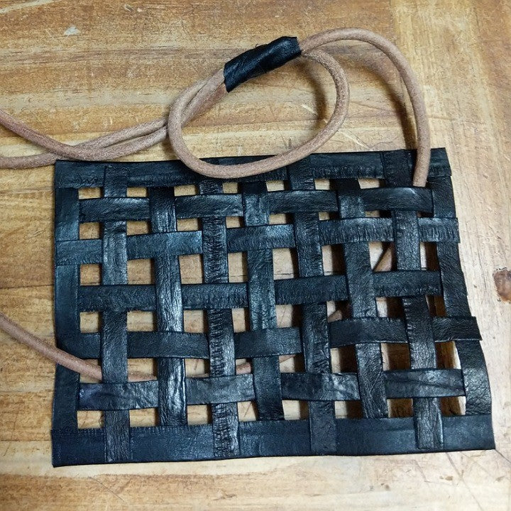 WEARABLE ART NECKLACE OF WOVEN EEL SKIN