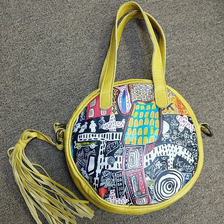 LEATHER BAG SAFFRON COLOUR ROUND
