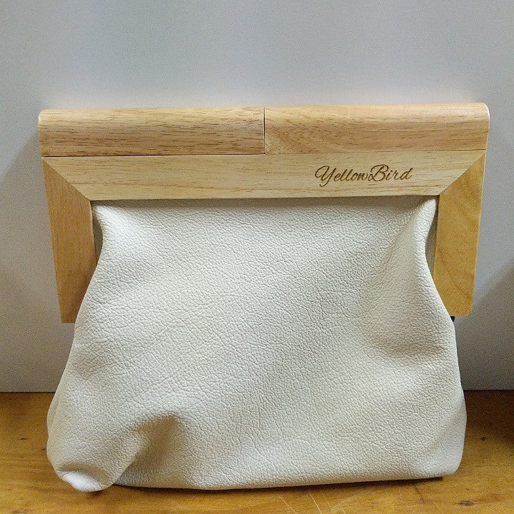 YELLOWBIRD LEATHER CLUTCH BAG