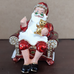 CHRISTMAS TRINKET SANTA IN CHAIR