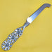 AUSTRALIAN MADE SILVER PEWTER CHEESE KNIFE [DESIGN:FLANNEL FLOWER]
