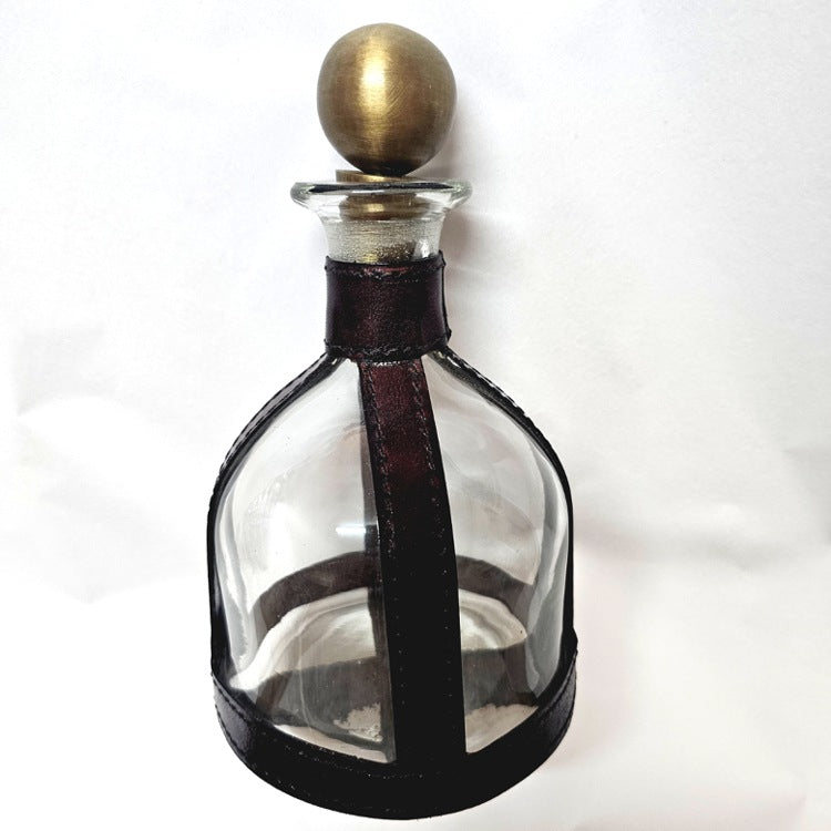 LEATHER BOUND DECANTER WITH BRASS STOPPER