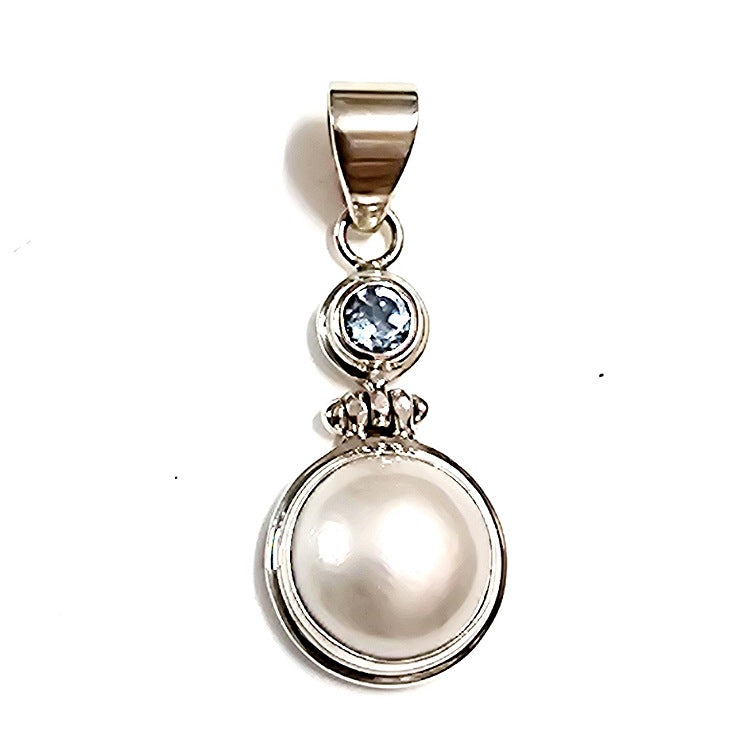 STERLING SILVER MABE PEARL BLUE TOPAZ PENDANT