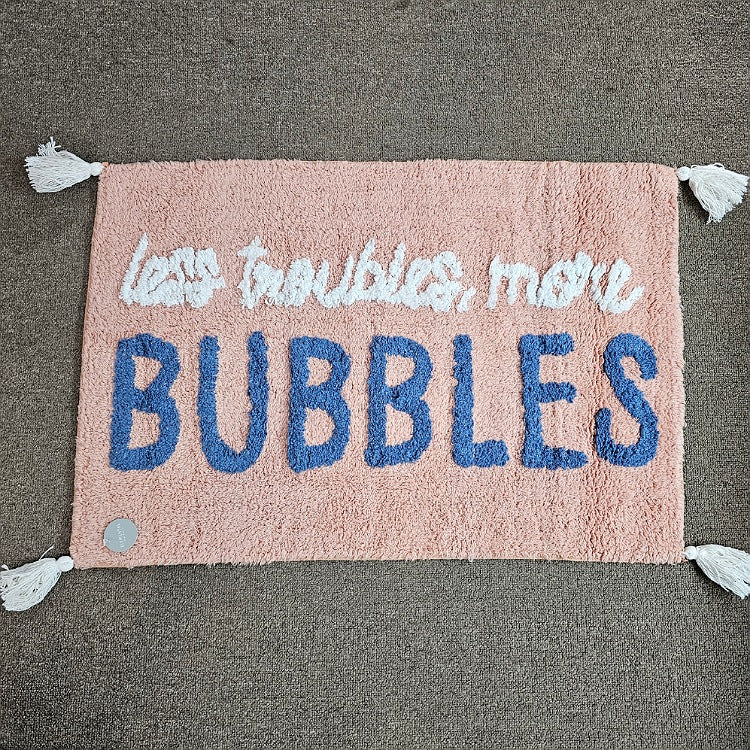 BATHMAT LESS TROUBLES MORE BUBBLES