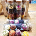 FLORAL TEA BALLS IN GLASS CANNISTER