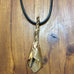 ITALIAN BRASS AND LEATHER LILLY PENDANT