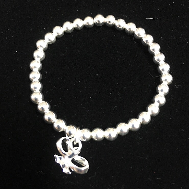 STERLING SILVER BABY BRACELET WITH BOW PENDANT