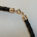 BLACK PLAITED LEATHER NECKLET WITH STERLING SILVER CLASP
