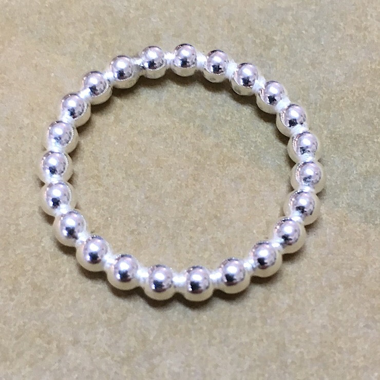 CONNECTING BALLS OF STERLING SILVER RING