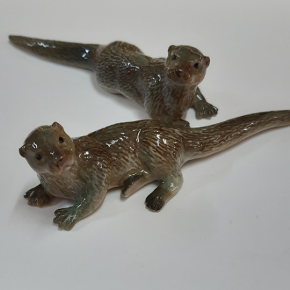 PORCELAIN FIGURINES OTTERS