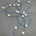 LONG LEATHER STRAND WITH PEARLS NECKLACE