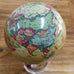 MAGNETICALLY SPINNING WORLD GLOBE ON STAND