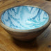 ROUND BOWL WOOD WITH BLUE PLANT ON WHITE